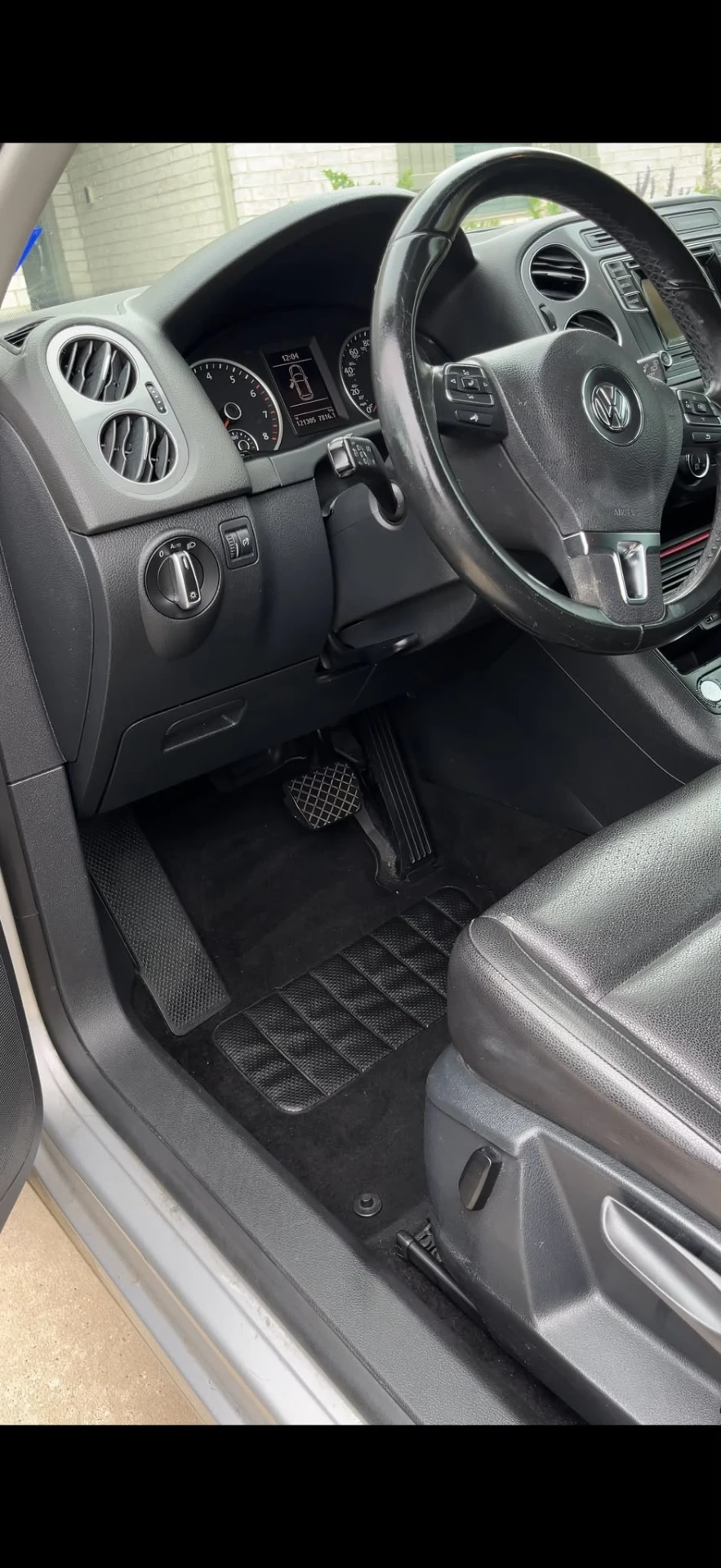 Volkswagen Tiguan driver footwell and dash after interior detail
