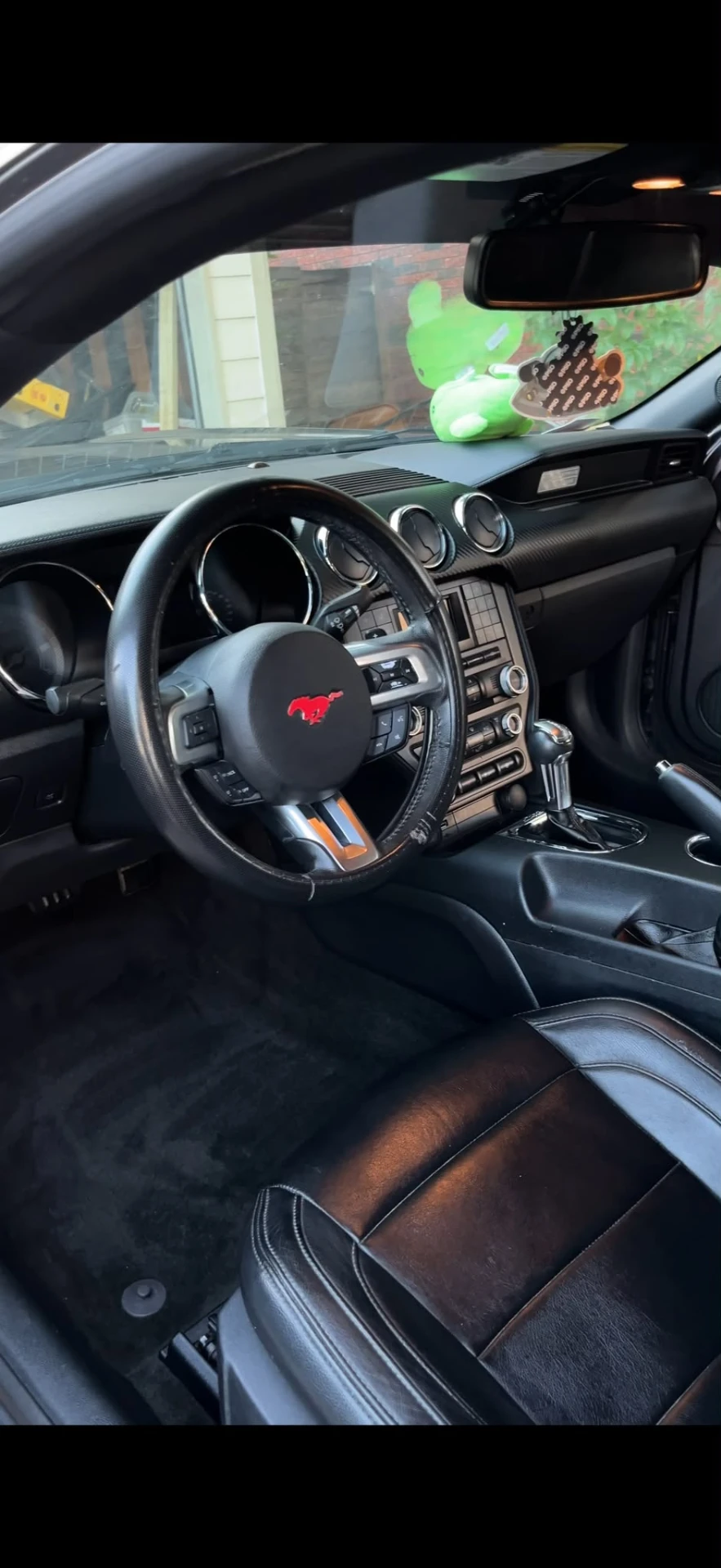 Ford Mustang interior after a full detail — dash, console and carpets